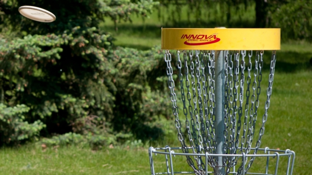 frisbee going into disc golf point