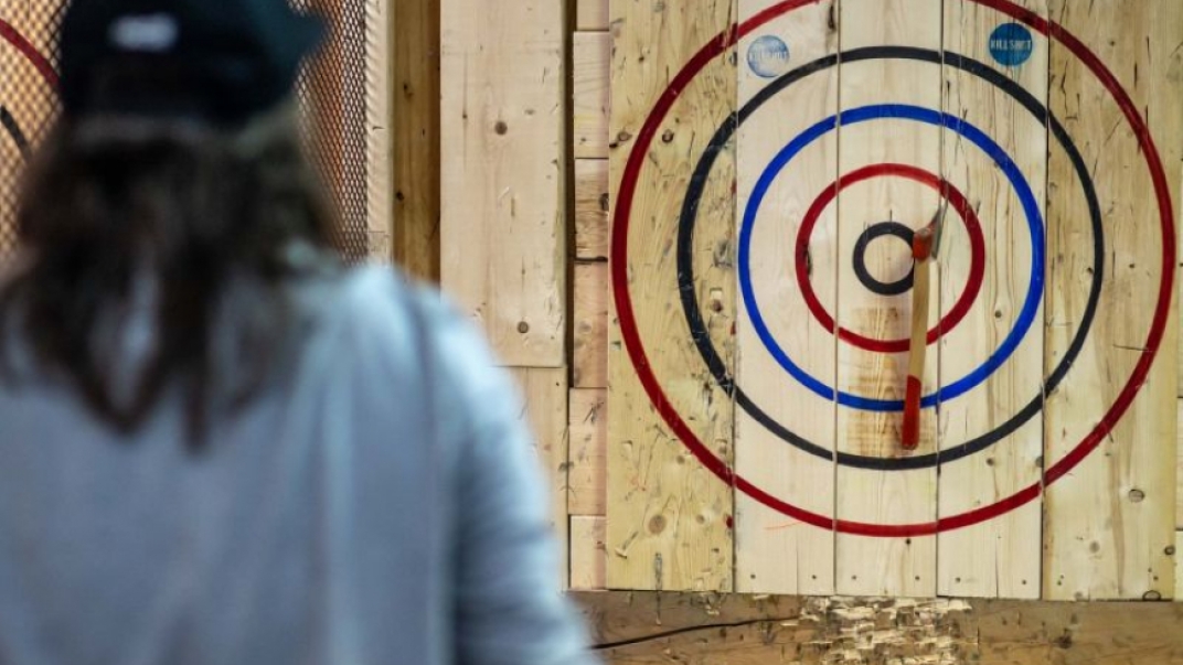 Axe on bullseye at axe throwing place