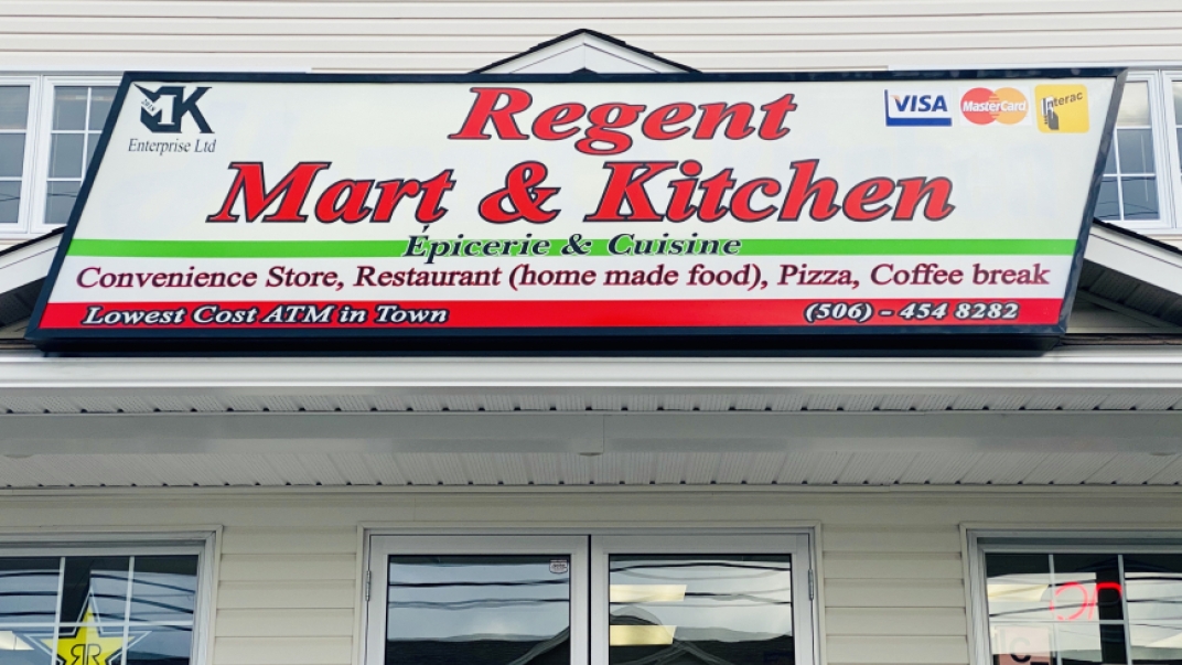 the regent mart & kitchen building sign