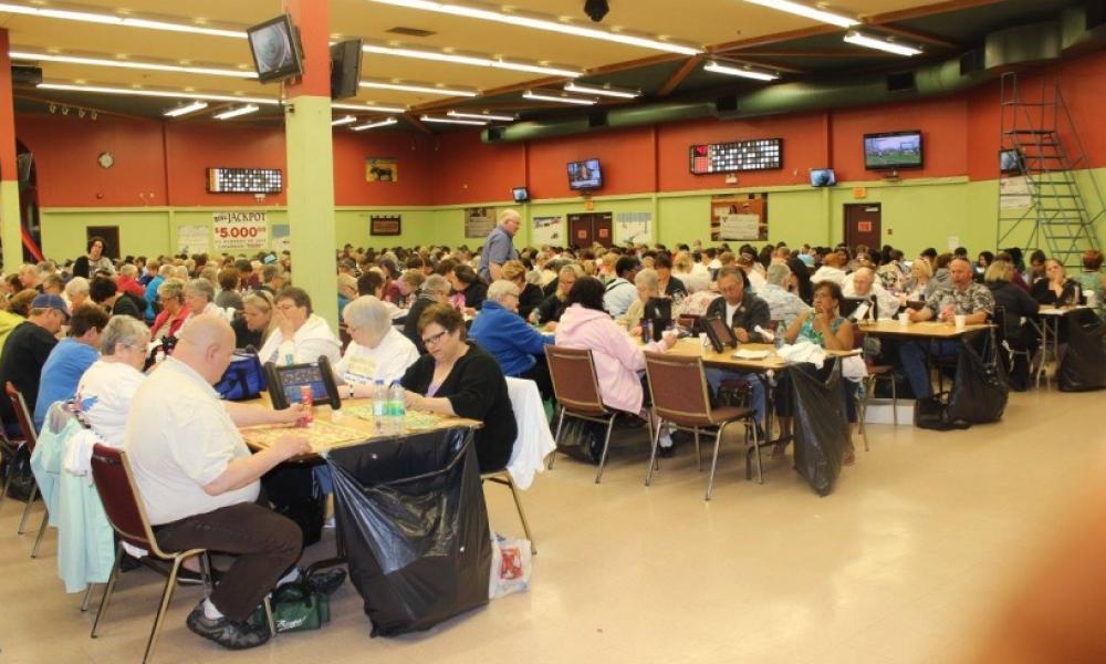 Room of elderly people playing bingo